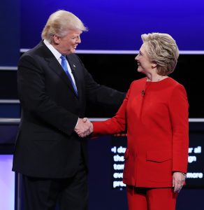 Democrat Hillary Clinton (R) and Republican Donald Trump (L) shake hands at the start of the first Presidential Debate at Hofstra University in Hempstead, New York, USA, 26 September 2016. The only Vice Presidential debate will be held on 04 October in Virginia, and the second and third Presidential Debates will be held on 09 October in Missouri and 19 October in Nevada. EPA/JUSTIN LANE