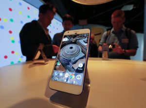 Guests inspect the new Pixel phone by Google after it was introduced at a Google product event in San Francisco, California, USA, 04 October 2016. EPA