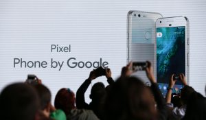 Attendees take pictures of the stage during the launch of the Google Pixel phone at a Google product event in San Francisco, California, USA, 04 October 2016. EPA/JOHN G MABANGLO