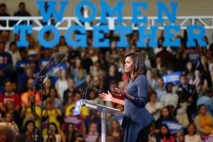 First Lady of the United States Michelle Obama addresses a crowd during a campaign stop at Southern New Hampshire Univeristy for Democratic Party presidential candidate Hillary Clinton, in Manchester, New Hampshire, USA, 13 October 2016. EPA/CJ GUNTHER