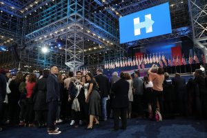 People take photos in front of the main stage at Hillary Clinton's 2016 US presidential Election Night event at the Jacob K. Javits Convention Center in New York, New York, USA, 08 November 2016. Americans vote on Election Day to choose the 45th President of the United States of America to serve from 2017 through 2020. EPA/JUSTIN LANE