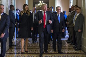 US President elect Donald Trump (C), with his wife Melania Trump (L), and Senate Majority Leader Mitch McConnell (R), gives the thumbs up after a meeting in the Majority Leaders office in the US Capitol in Washington, DC, USA, 10 November 2016. Earlier in the day President elect Trump met with US President Barack Obama and Speaker of the House Paul Ryan. EPA/SHAWN THEW