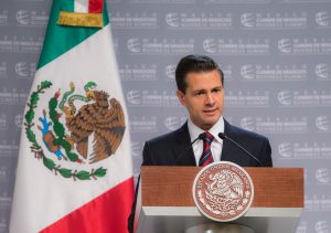A handout picture provided by the Mexican Presidency, shows the Mexican President Enrique Peña Nieto, who speaks during his participation at the 14 edition of the Business Summit in Puebla, Mexico, on 15 November 2016, where he said that the future dialogue with the next government of Donald Trump will be marked by "enormous pragmatism", the defense of the country's sovereignty and the protection of its citizens. EFE