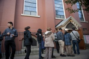 Voters wait outside a polling location for the 2016 US presidential election after polls opened at Annunciation Church in Philadelphia, Pennsylvania, USA, 08 November 2016. Americans vote on Election Day to choose the 45th President of the United States to serve from 2017 through 2020. EPA/TRACIE VAN AUKEN